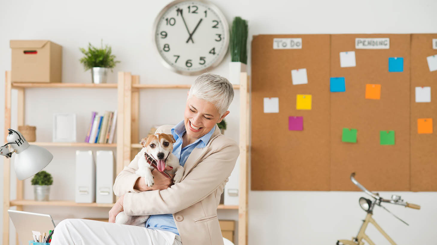 A woman relaxing with her dog
